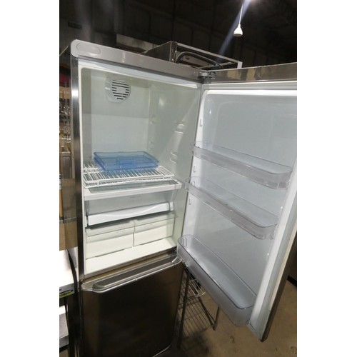 1200 - A stainless steel fridge freezer by Ariston type A.I.R - trade. Tested Working