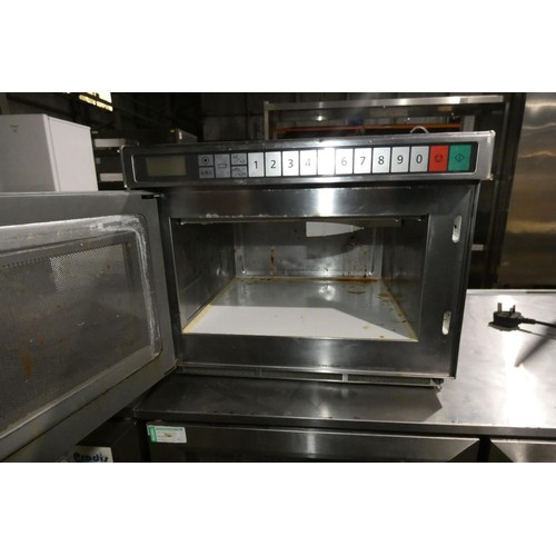 1204 - A commercial stainless steel microwave oven no make or model visible