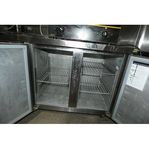 1223 - A commercial stainless steel 2 door bench fridge by Foster type Xtra - unit requires attention - tra... 