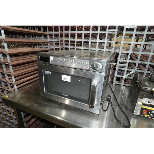 1230 - A commercial stainless steel microwave oven by Samsung type 1850w CM1929 - trade