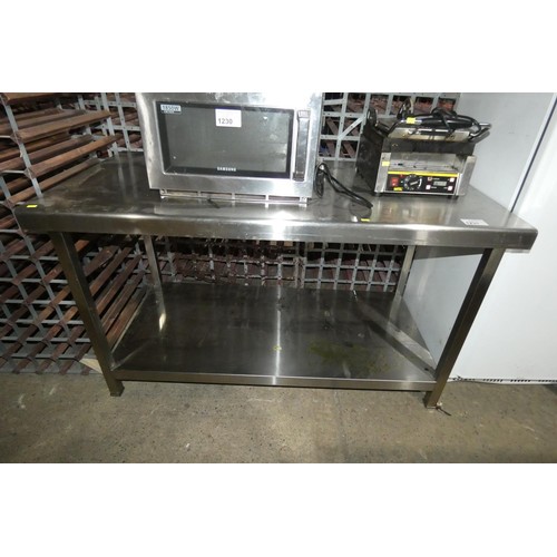 1231 - A commercial stainless steel catering type table with shelf beneath approx 140x70cm