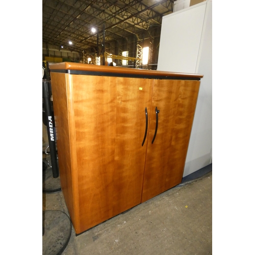 1328 - A wood effect 2 door cabinet approx 100x55x105cm