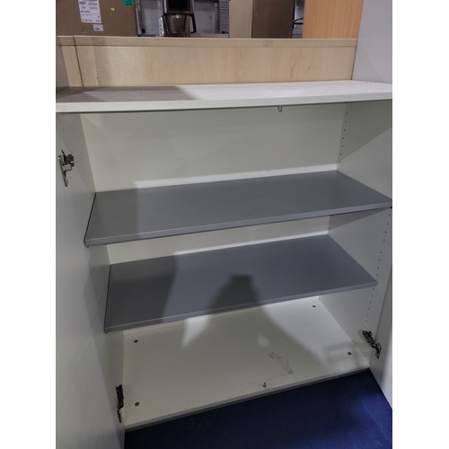 1356 - A white 2 door office cabinet approx 100x50x107cm