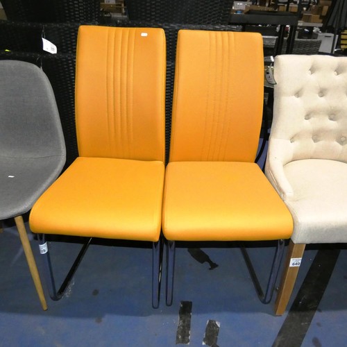 639 - 2 x orange upholstered metal framed dining chairs