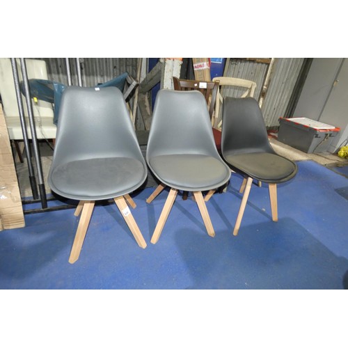 646 - 2 x grey plastic dining chairs and 1 x black upholstered dining chair