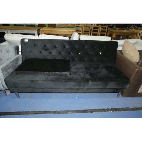 650 - A black upholstered click clack type sofa bed - Please note that this sofa is supplied with one end ... 