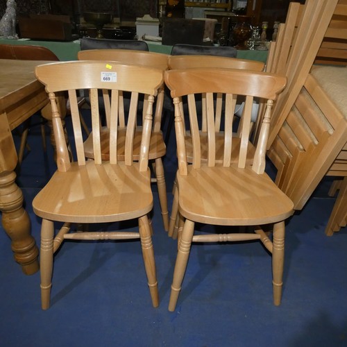 669 - A set of 4 traditional style curved back wooden dining chairs