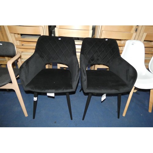 681 - 2 x black upholstered dining chairs