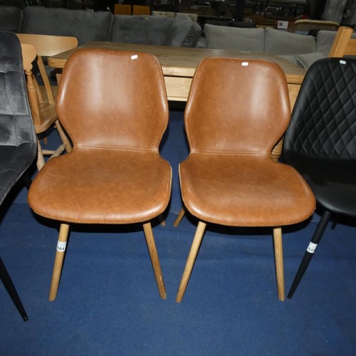 684 - 2 x soft brown upholstered dining chairs with wooden legs