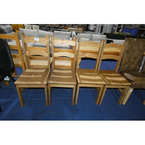 686 - 4 x wooden dining chairs