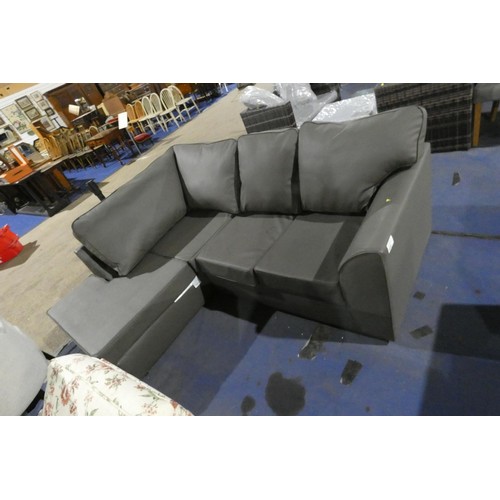 654 - A grey upholstered corner sofa approx 213 x 164cm - Please note that the fabric is torn in several p... 