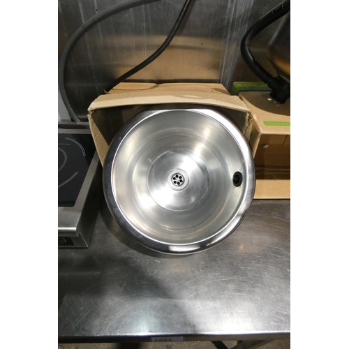 1250 - A commercial stainless steel round sink bowl approx 30cm