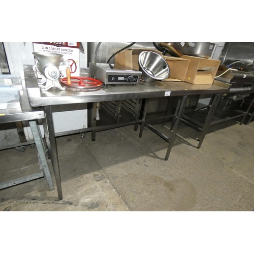 1253 - A commercial stainless steel catering type table approx 214x70cm