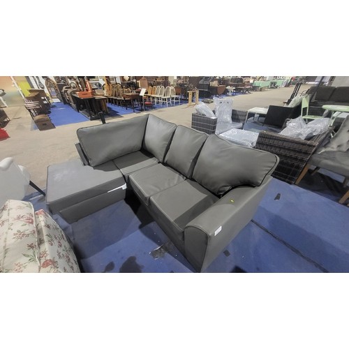 654 - A grey upholstered corner sofa approx 213 x 164cm - Please note that the fabric is torn in several p... 