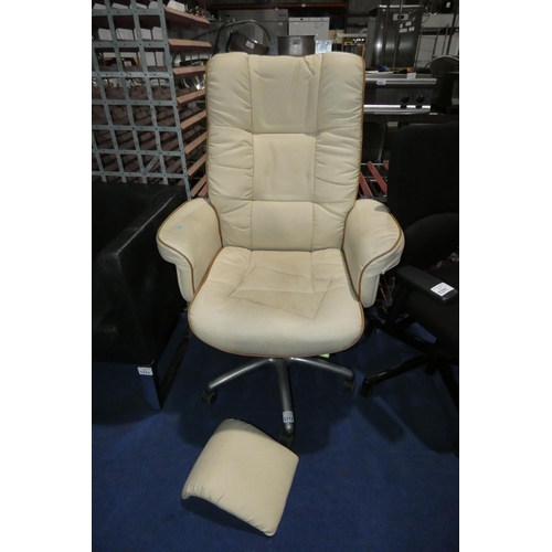 1312 - A cream leather effect office swivel chair (please note the head rest requires attention)