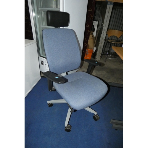 1317 - A blue upholstered office swivel chair by Sedus