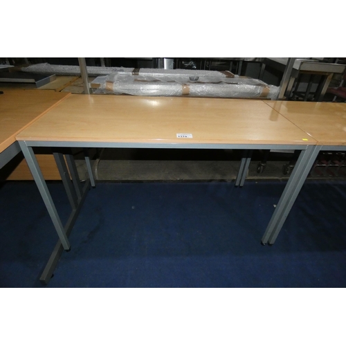 1319 - A metal framed desk with a wood effect top measuring approx 120cm x 60cm