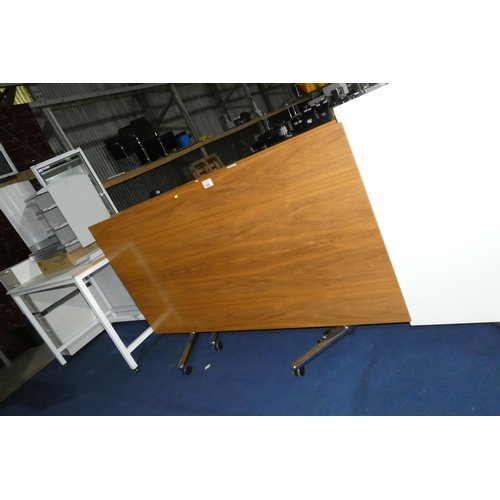 1340 - A wood effect folding office Table with chrome legs measuring approx 200cm x 100cm