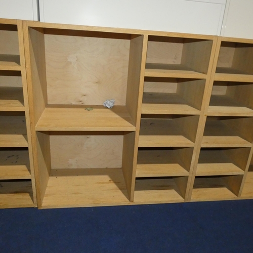 1375 - A wooden pigeon hole unit with two large compartments and five small compartments measuring approx 8... 