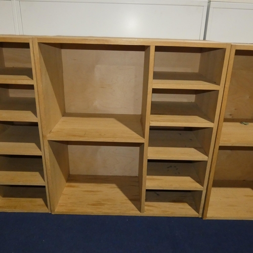 1376 - A wooden pigeon hole unit with two large compartments and five small compartments measuring approx 8... 