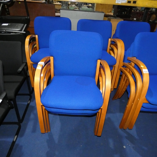 1394 - A set of 9 wooden stacking chairs with blue upholstered seats