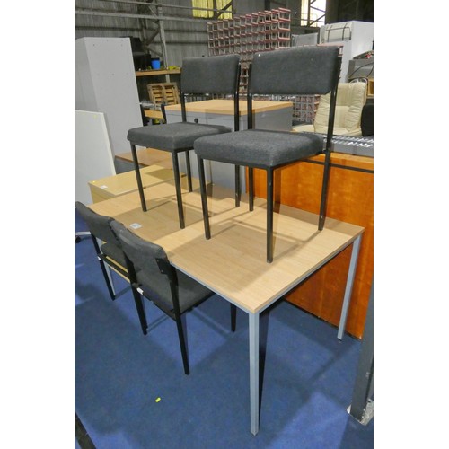 1337 - A wood effect rectangular table approx 140 x 80cm and 4 x black upholstered chairs