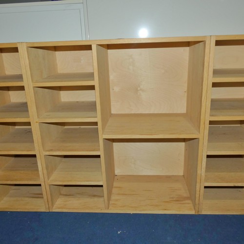 1374 - A wooden pigeon hole unit with two large compartments and five small compartments measuring approx 8... 