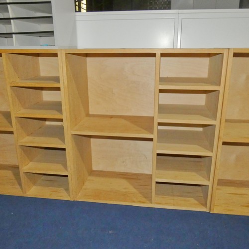 1377 - A wooden pigeon hole unit with two large compartments and five small compartments measuring approx 8... 