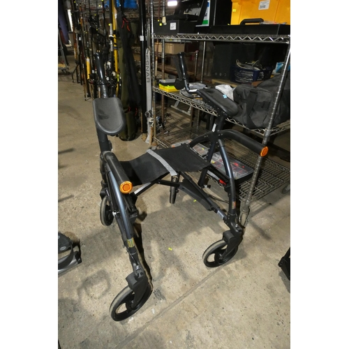 2061 - A folding walking aid by Up-Walker with seat and brakes