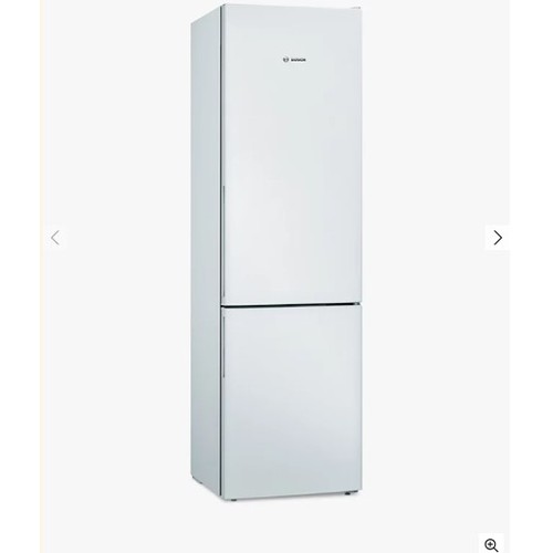 1186 - An unused tall integrated fridge freezer by Bosch type KGV39VWEAG. Retail approx £600