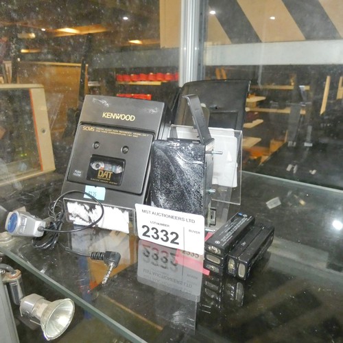 A portable Kenwood DAT digital audio tape recorder type DX-7