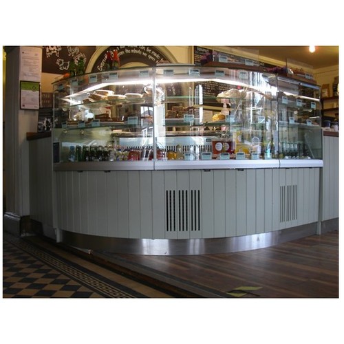 1007 - An unused commercial stainless steel curved/corner refrigerated serve over counter by Ciam of Italy,... 