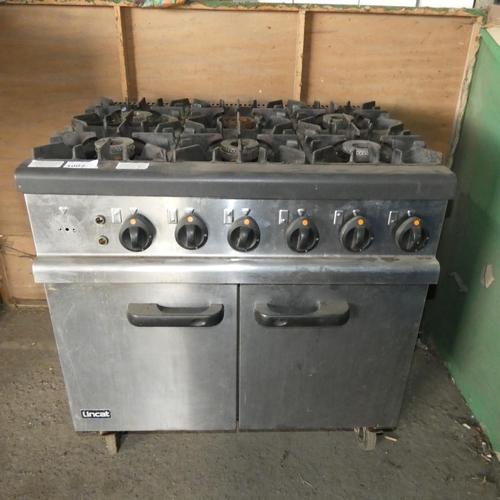1002 - A commercial stainless steel 6 ring gas fired range by Lincat, 1 burner top missing - trade