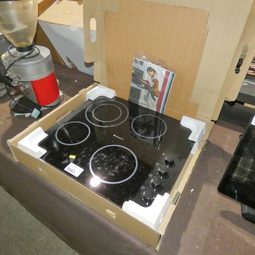 1083 - A boxed integrated black 4 ring electric ceramic hob by Hotpoint type CRM641DC approx 60cm