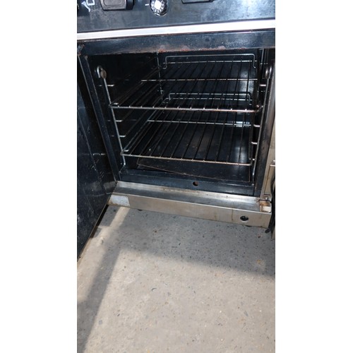 1138 - A commercial stainless steel 4 ring gas fired range by Blue Seal with single door oven beneath appro... 