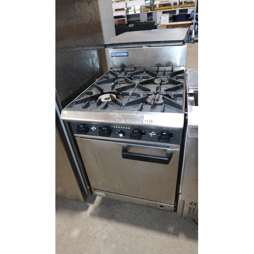 1138 - A commercial stainless steel 4 ring gas fired range by Blue Seal with single door oven beneath appro... 