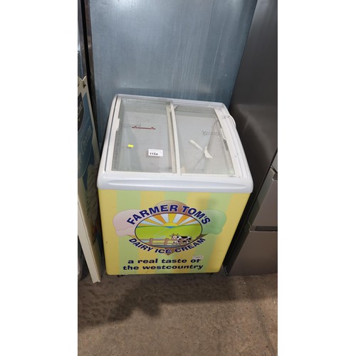 1154 - An ice-cream display freezer, with 2 glass sliding doors - trade. Tested Working... Refunded claimed... 