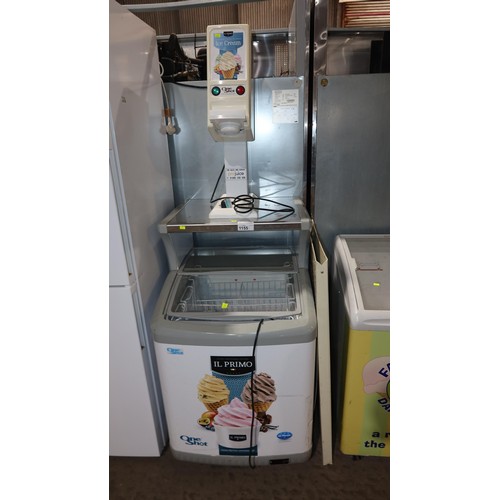 1155 - An ice-cream freezer with shelf above, a one shot ice-cream dispenser and an ice-cream sign .Freezer... 