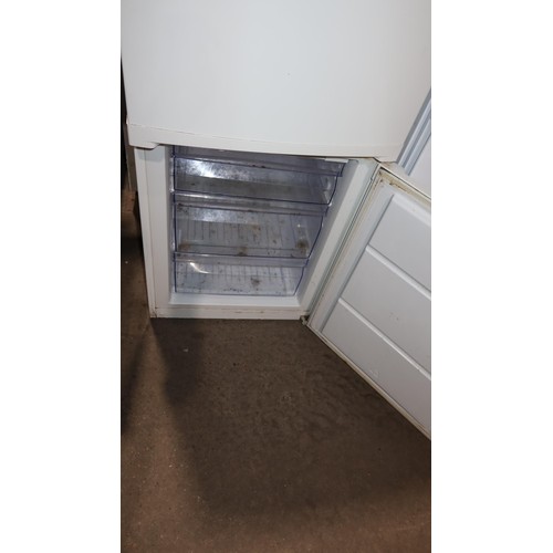 1157 - A tall fridge freezer by Zanussi type ZRB939NW2 approx 2m tall