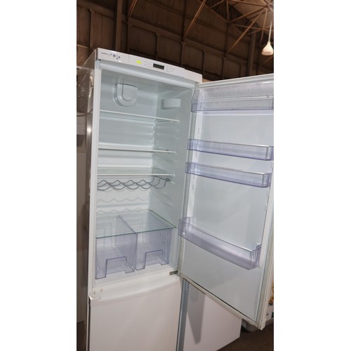 1157 - A tall fridge freezer by Zanussi type ZRB939NW2 approx 2m tall