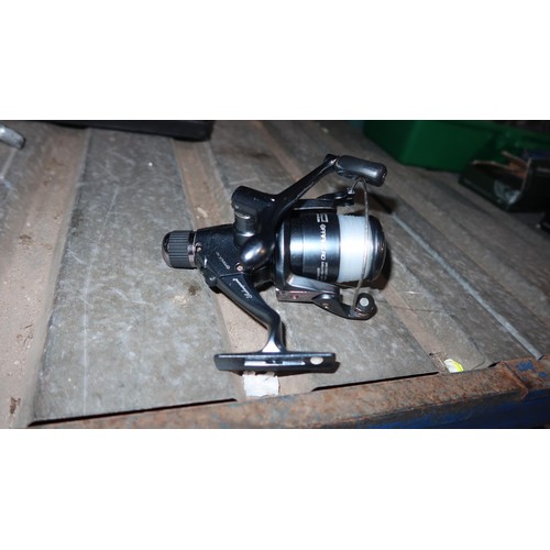 2021 - A quantity of various fishing related items including 4 x various reels