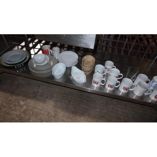 1130C - A quantity of various catering related items including mugs, plates etc