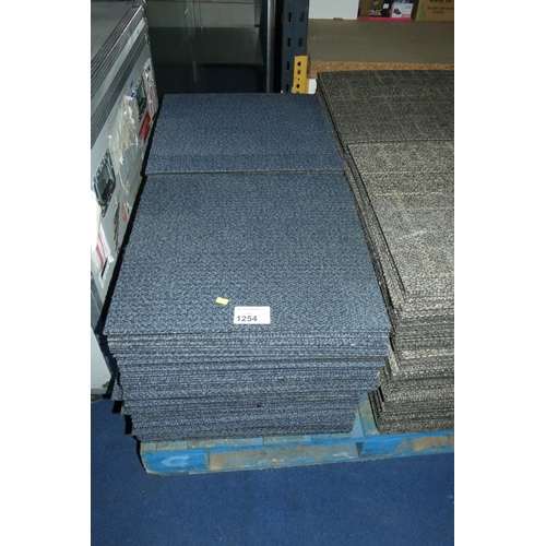 1254 - A quantity of approx 200 blue patterned carpet tiles approx 50x50cm