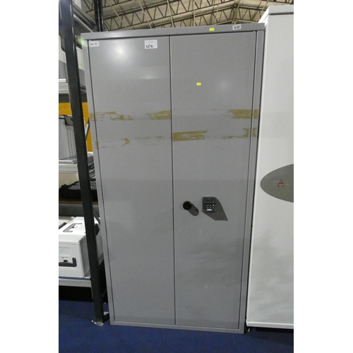 1276 - A heavy duty grey metal cabinet approx 92x183x55cm, it has an electric lock attached, but had been d... 