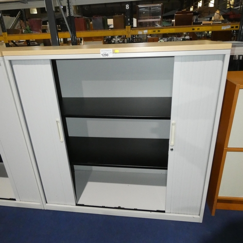 1290 - A white metal 2 tambour door office cabinet by Triumph approx 120x48x121cm