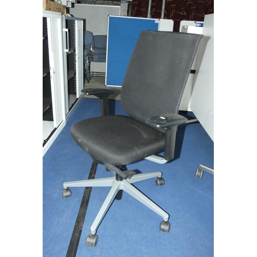 1309 - A black upholstered office swivel chair by Steelcase