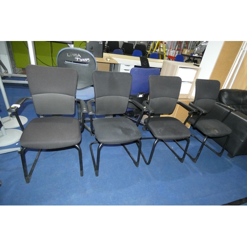 1310 - A set of 4 black upholstered office meeting room cantilever chairs by Steelcase