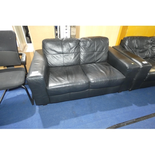 1311 - A black upholstered 2 person sofa