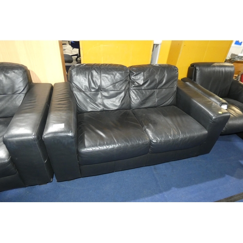 1312 - A black upholstered 2 person sofa