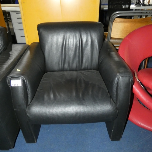 1313 - A black upholstered armchair/tub type chair